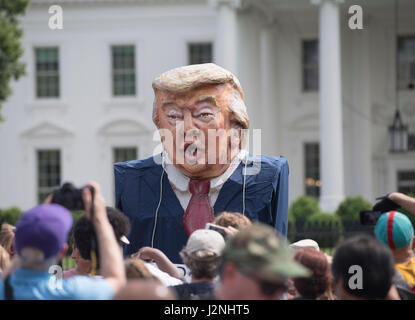 Washington, District of Columbia, USA. 29th Apr, 2017. A character of President Trump is displayed in front of the White House during the People's Climate March. Credit: Robin Loznak/ZUMA Wire/Alamy Live News Stock Photo