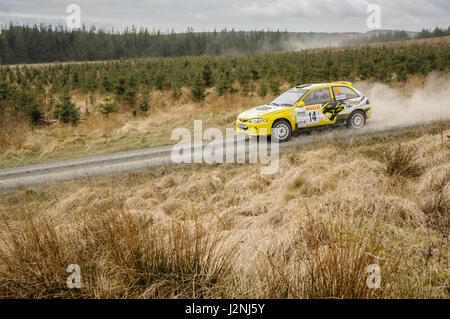 Wark, UK - 29th April, 2017: Rally car taking part in the Pirelli International Rally 2017 (Historic Section).  Driver Mat Smith and Co-Driver Giles Dykes in a Proton Satria. Credit: ColobusYeti/Alamy Live News. Stock Photo