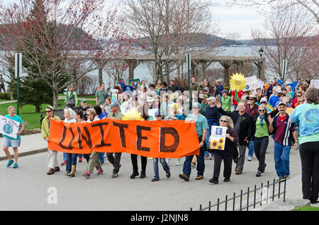 Bar Harbor, USA. 29 April, 2017. Protesters in the Downeast Climate March, a sister march to the People's Climate March in Washington, D.C., walk up Main Street. Stock Photo