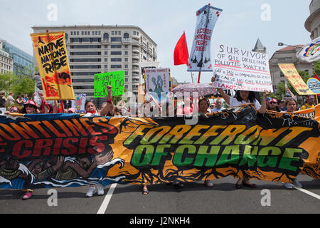 Washington, DC, USA, 29th Apr. 2017:  Thousands of Indigenous Americans, environmentalists, scientists, immigrants, religious, educators, and many others gather in Washington to resist against the Trump administration's 'attack' on the climate, air, and water during the People's Climate March. Credit: B Christopher/Alamy Live News Stock Photo