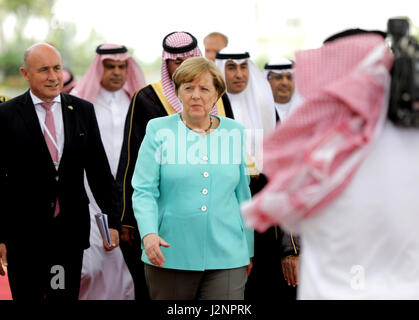 Jeddah, Saudi Arabia. 30th Apr, 2017. German Chancellor Angela Merkel (CDU) is welcomed at the royal terminal of the International Airport in Jeddah, Saudi Arabia, 30 April 2017. Photo: Kay Nietfeld/dpa/Alamy Live News Stock Photo