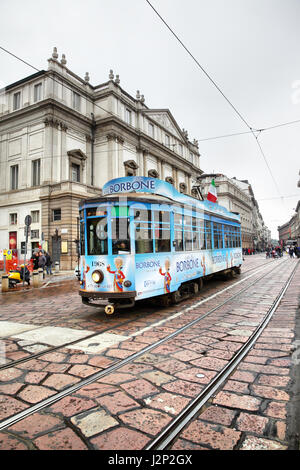 Milan, Italy - October 15, 2016: Vintage tram in front of La Scala theater in Milan Stock Photo