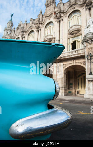 Detail close up of the tail fin of a classic American car parked in front of the Great Theatre of Havana, in Cuba Stock Photo