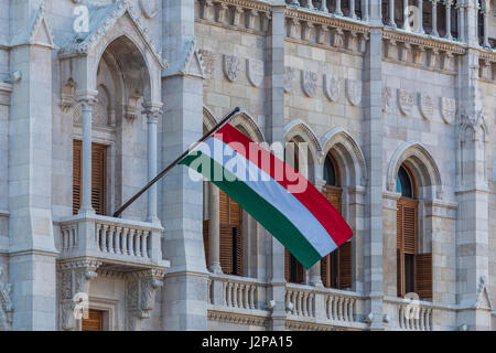 The Hungarian flag on the Hungarian Parliament Building in Budapest Stock Photo