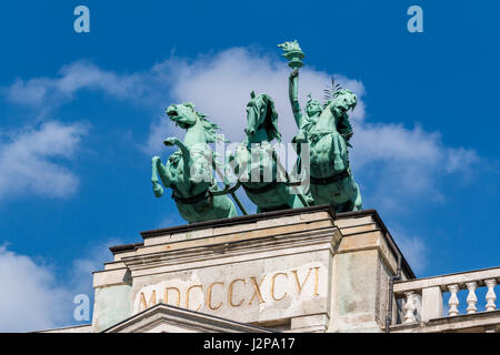 The equestrian statue of Veritas atop the Palace of Justice (today the Ethnographic Museum) in Budapest Stock Photo