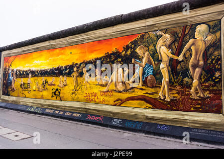 BERLIN, GERMANY - MARCH 20: Berlin Wall graffiti seen on March 22, 2015, Berlin, East Side Gallery. It's a 1.3 km long part of original Berlin Wall wh Stock Photo