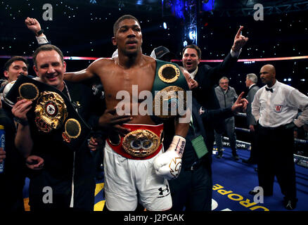 Anthony Joshua celebrates victory over Wladimir Klitschko following the IBF, WBA and IBO Heavyweight World Title bout at Wembley Stadium, London. Stock Photo