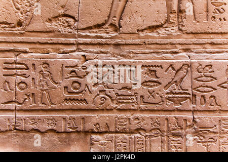 Stone wall with carved ancient Egyptian bas relief Stock Photo - Alamy