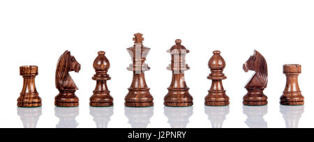 Wooden chess. Set of chess figures. Chess pieces isolated on  white background. Stock Photo
