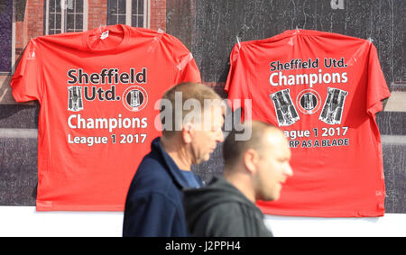 Sheffield United fans make their way to the stadium before the Sky Bet League One match at Bramall Lane, Sheffield. Stock Photo