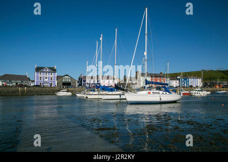 Aberaeron - a charming Georgian port town on the Cardigan Bay coast of West Wales. Yachts and motor Boats anchored in the harbour Stock Photo