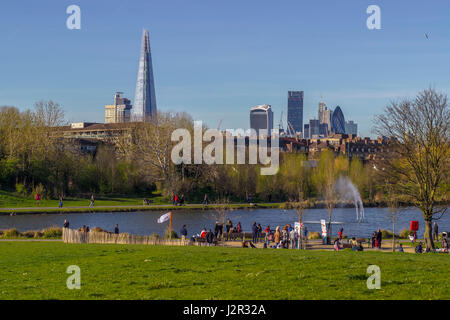 London, England - 25th of March 2017: A crowded Burgess Park on one of the first sunny days of the year. Stock Photo