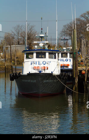 BELFORD, NEW JERSEY - April 11, 2017: Pilot boats are docked at the Belford Seafood Cooperative Stock Photo