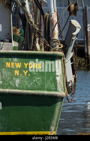 BELFORD, NEW JERSEY - April 11, 2017: Commercial fishing boats are docked at the Belford Seafood Cooperative Stock Photo