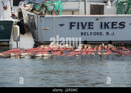 BELFORD, NEW JERSEY - April 11, 2017: The Five Ikes fishing boat is docked at the Belford Seafood Cooperative Stock Photo