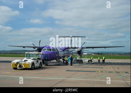 A Flybee propeller plane waits for passengers to load at Exeter Airport Devon England before setting off for Edinburgh Stock Photo