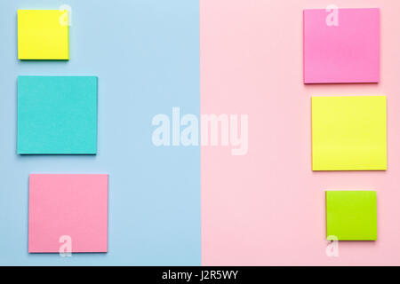 Colorful sticky notes on pastel background. Minimal style. Flat lay. Copy space. Top view Stock Photo