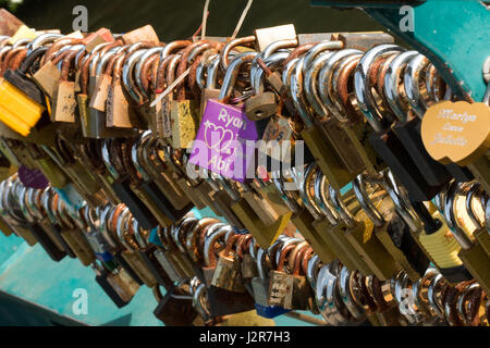 Love locks on the river bridge at Bakewell Derbyshire Stock Photo