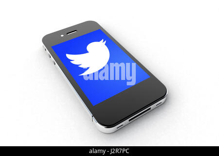 Tourin, Italy - March 14, 2015: Black Smart Phone with Twitter Symbol on the white Table. Stock Photo