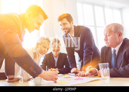 Business team work together planning strategy in cooperation Stock Photo