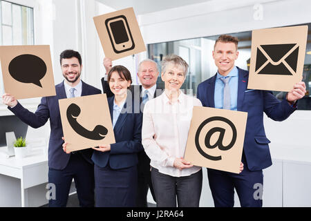 Team with contact options as business communication or customer service concept Stock Photo
