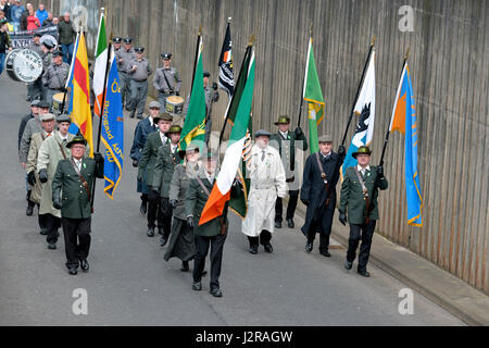 A dissident republican colour party and band at an Unfinished Revolution Easter parade in Derry, Londonderry, Northern Ireland. Stock Photo