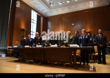 Various chiefs of reserve forces prepare to testify at the Senate Appropriations Subcommittee Defense hearing on National Guard and Reserve Programs and Readiness, April 26, 2017. From left to right: Air Force Gen. Joseph Lengyel, chief of the National Guard Bureau; Lt. Gen. Charles D. Luckey, chief of the Army Reserve; Vice Adm. Luke M. McCollum, chief of the Navy Reserve; Lt. Gen. Rex C. McMillian, commander of Marine Corps Forces Reserve and Lt. Gen. Maryanne Miller, chief of Air Force Reserve. (National Guard photo by Tech. Sgt. Erich B. Smith/Released) Stock Photo