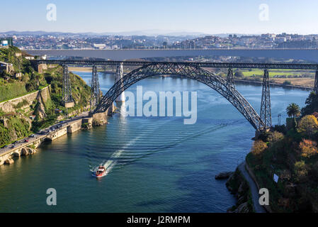 View from Infante D. Henrique Bridge on a Maria Pia Bridge old railway bridge over Douro river between Porto (L) and Vila Nova de Gaia, Portugal Stock Photo