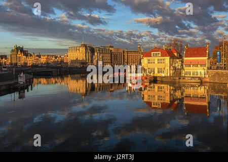 Amsterdam, Netherlands – October 30, 2016: The side of the historic waterfront property located on Stationsplein in Amsterdam Stock Photo