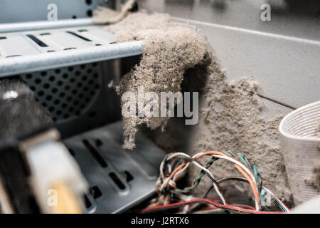 Hardware service a scene. Dust layer inside the computer case. Stock Photo