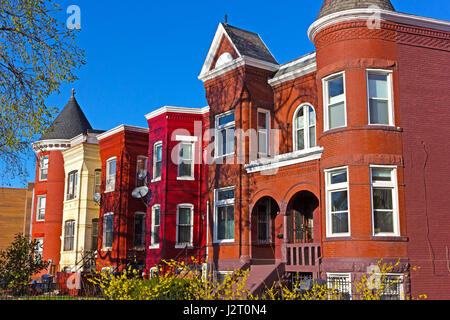 Residential townhouses of suburban Washington DC in spring. Colorful urban architecture of Shaw neighborhood in US capital. Stock Photo