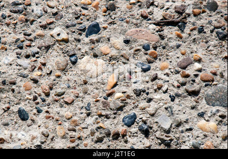 Heart of stone between multi colored natural stones Stock Photo