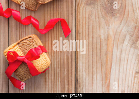 Homemade cookies with a bow. copy space Stock Photo