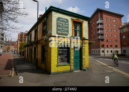 Landmark Manchester green tiled clad Victorian pub Peveril of the Peak Stock Photo