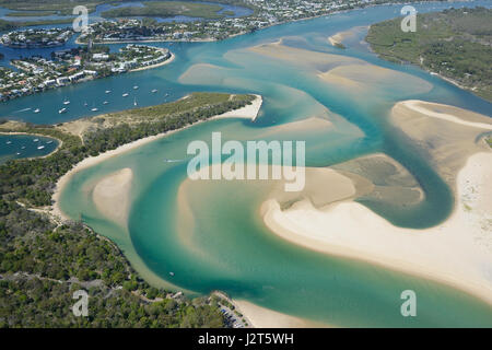 AERIAL VIEW. Seaside resort near the mouth of a colorful estuary. Noosa Heads, Sunshine Coast, Queensland, Australia. Stock Photo