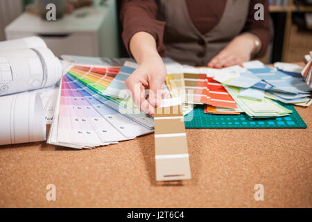 Architect choosing from different colors on the cards Stock Photo