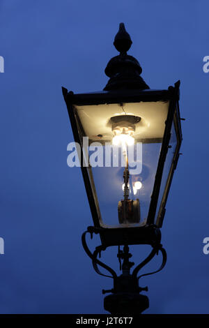 Old electric light on train platform Stock Photo
