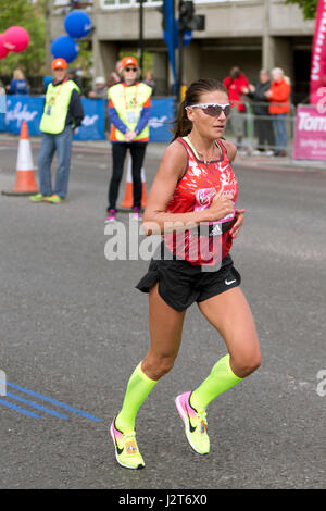 Diana Lobacevske running in the Virgin Money London Marathon 2017, The Highway, London, UK. Stock Photo