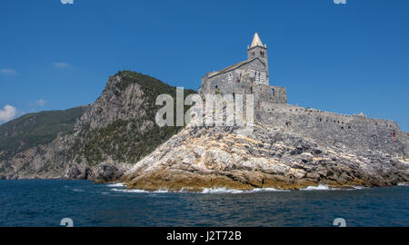 The Chiesa di San Pietro, taken from a boat entering Portovenere in Liguria, Italy Stock Photo