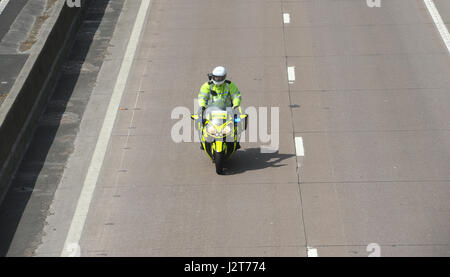 POLICE MOTORCYCLIST RIDER PATROLLING ON THE M54 MOTORWAY IN SHROPSHIRE UK Stock Photo