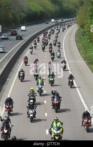 MOTORCYCLISTS RIDING IN CHARITY RIDE OUT EVENT ON THE M54 MOTORWAY IN SHROPSHIRE UK Stock Photo