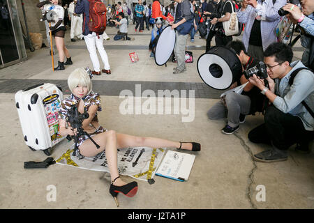 Chiba, Japan. 30th Apr, 2017. Photographers take pictures of a cosplayer during the Niconico Chokaigi festival in Makuhari Messe Convention Center on April 30, 2017, Chiba, Japan. Niconico is a Japanese social video website with over 62 million registered users. The two day Niconico Chokaigi festival allows users and creators to communicate face to face. Credit: Rodrigo Reyes Marin/AFLO/Alamy Live News Stock Photo