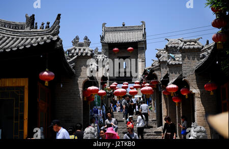 Xi'an, China's Shaanxi Province. 1st May, 2017. Tourists visit Yuanjia Village of Liquan County, northwest China's Shaanxi Province, May 1, 2017. Yuanjia Village has been taking advantage of rural resources to develop its folk tourism. Credit: Tao Ming/Xinhua/Alamy Live News Stock Photo