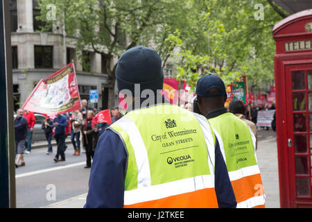 London, UK. 1st May, 2017. May Day March London UK watching the march go pass workers from City of Westminster street cleaners Credit: Brian Southam/Alamy Live News