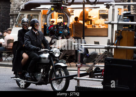 London, UK. 30th April, 2017. Vanessa Kirby (Princess Margaret) and Matthew Goode (Lord Snowdon) filming on a vintage motorbike Credit: Polly Thomas/Alamy Live News Stock Photo