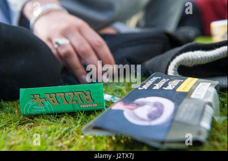 Smoking a roll up cigarette Stock Photo