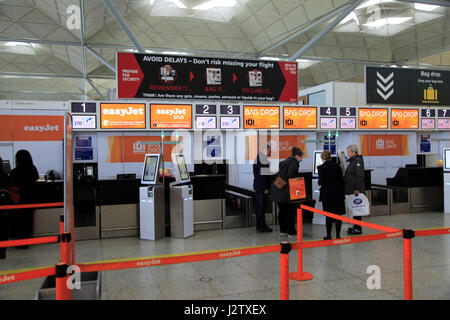 EasyJet check-in bag drop area, Stansted airport, Essex, England, UK Stock Photo