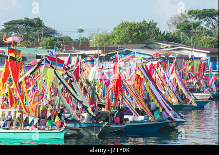 Traditional Bajau's boat called Lepa-Lepa decorated with colorfull Sambulayang flag during Regatta Lepa in Semporna. This and annual event and main at Stock Photo