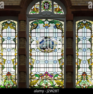 The gable-end stained glass window in the Victoria Baths, Manchester, England Stock Photo