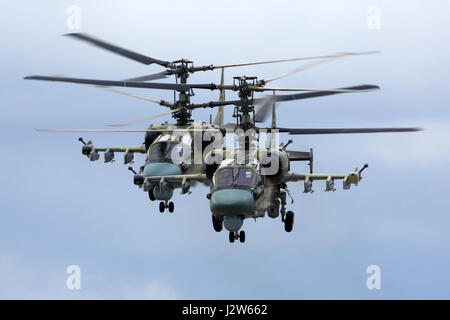KUBINKA, MOSCOW REGION, RUSSIA - APRIL 24, 2017: Pair of Kamov Ka-52 Alligator attack helicopters of Russian air force during Victory Day parade rehea Stock Photo